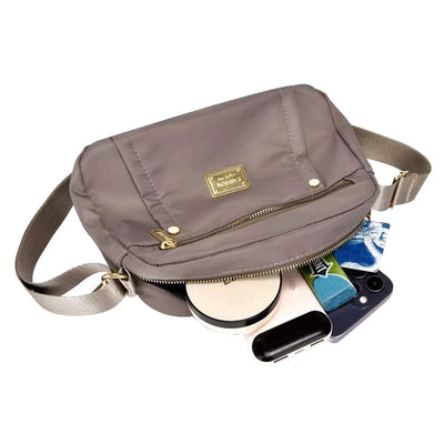 Men and women's cross-body bags are lightweight and multi-layered, perfect for shopping and traveling.